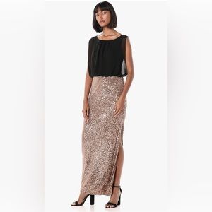 Black top, pink tan sequence bottom dress with side split. Worn once.